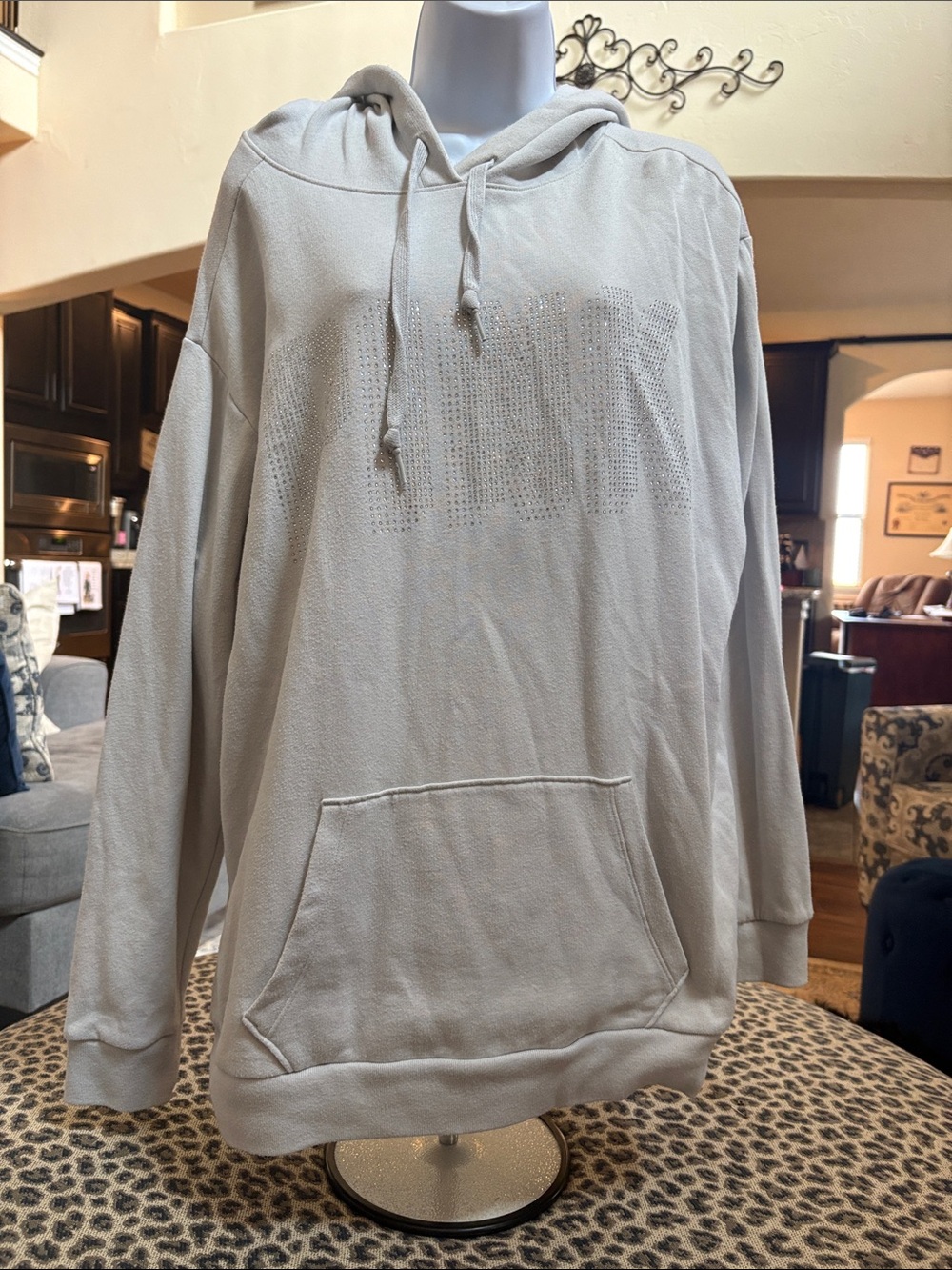 Women’s Light Gray Pullover Hoodie with Subtle Perforated Chest Detail